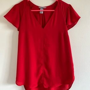 Bright red blouse